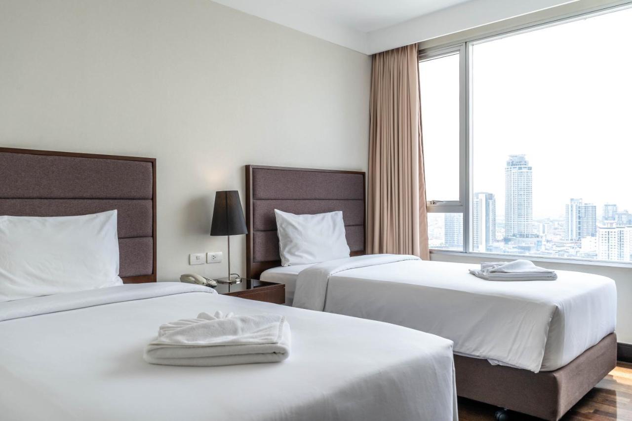 Jasmine Grande Residence Bangkok Ngoại thất bức ảnh A bedroom at the hotel