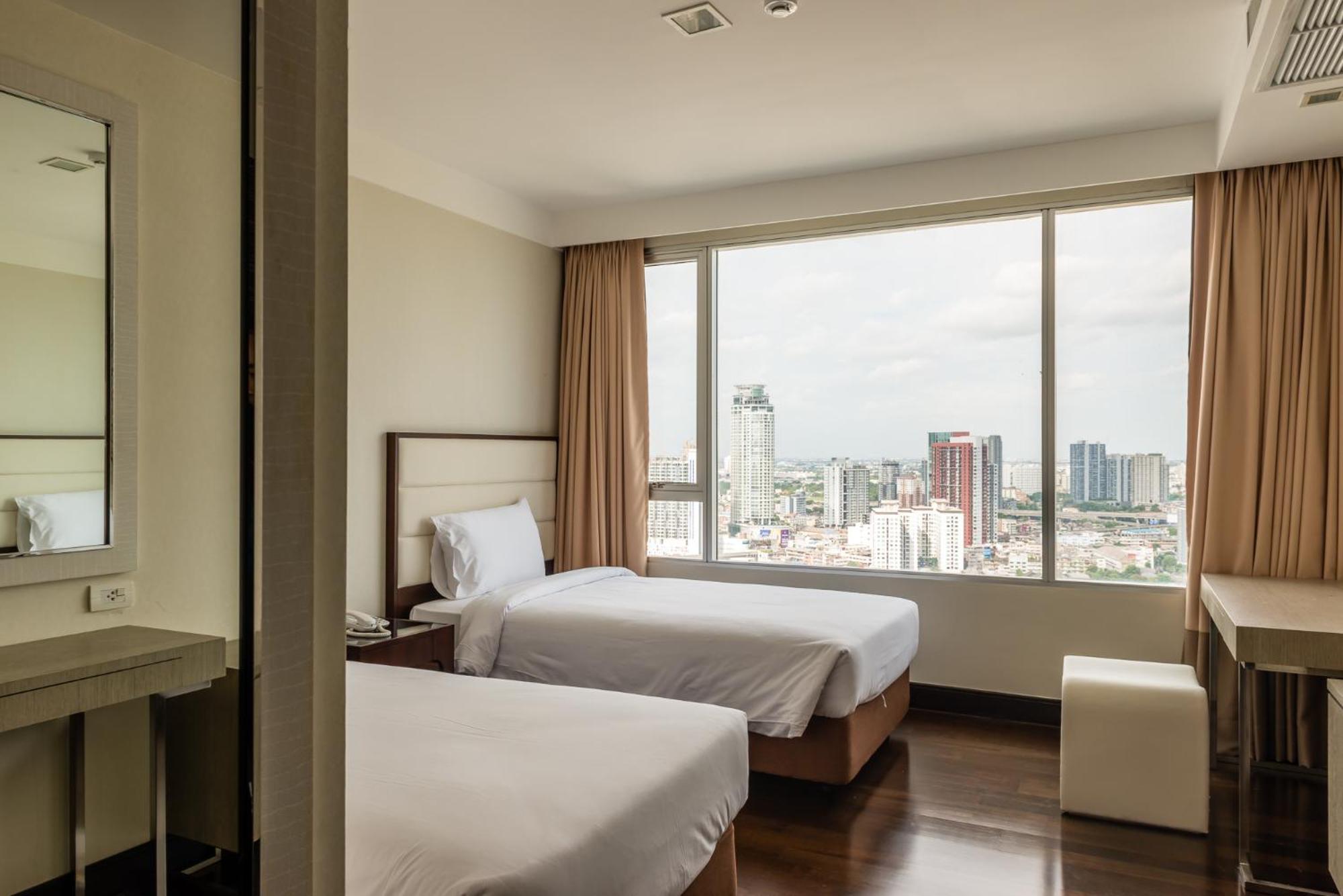 Jasmine Grande Residence Bangkok Phòng bức ảnh A guest room at the hotel